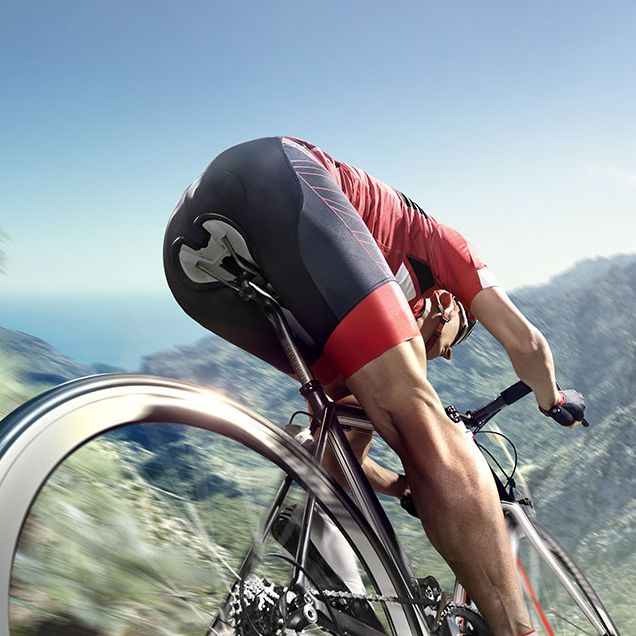 cyclist wearing chamois padding cycling shorts on road bike