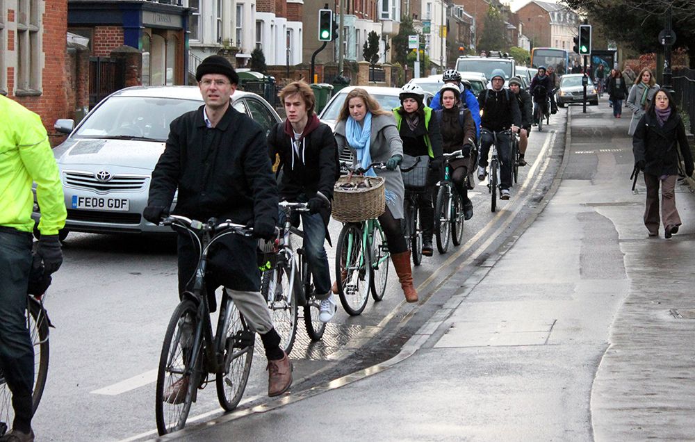 Cycling single file in Oxford Iffley Road.