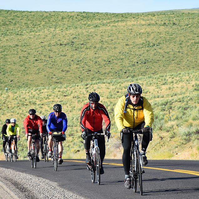 cyclists riding uphill in Oregon