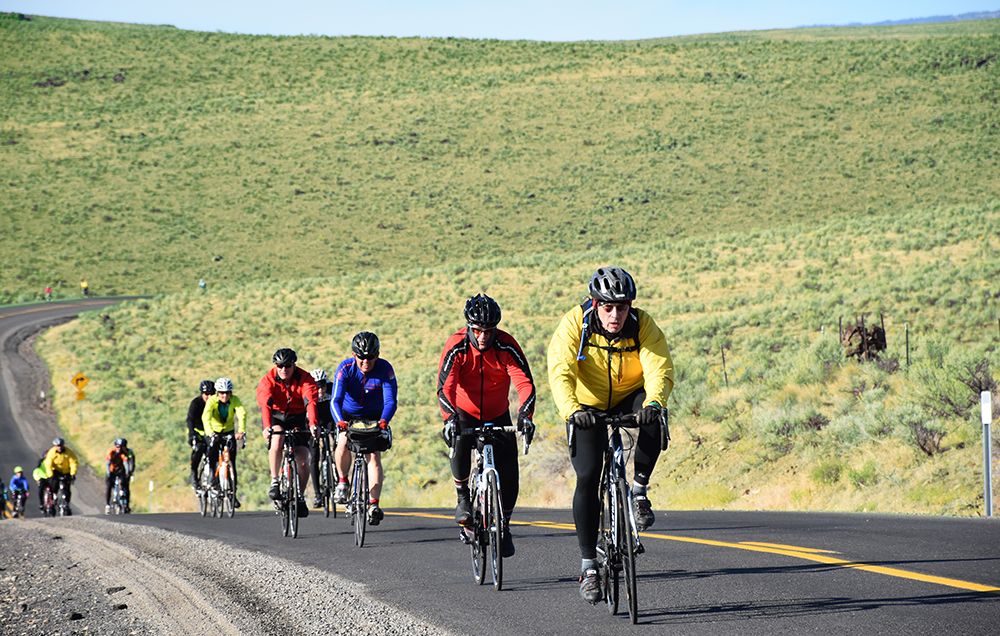 cyclists riding uphill in Oregon