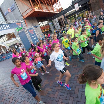 Young girls running at the RW Festival.