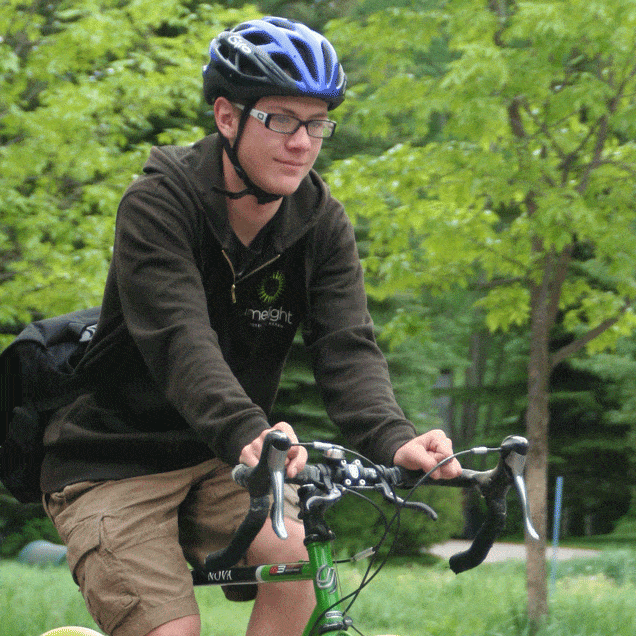 teen bike commuter in the summer