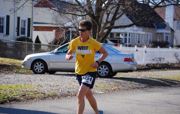 woman in yellow runs