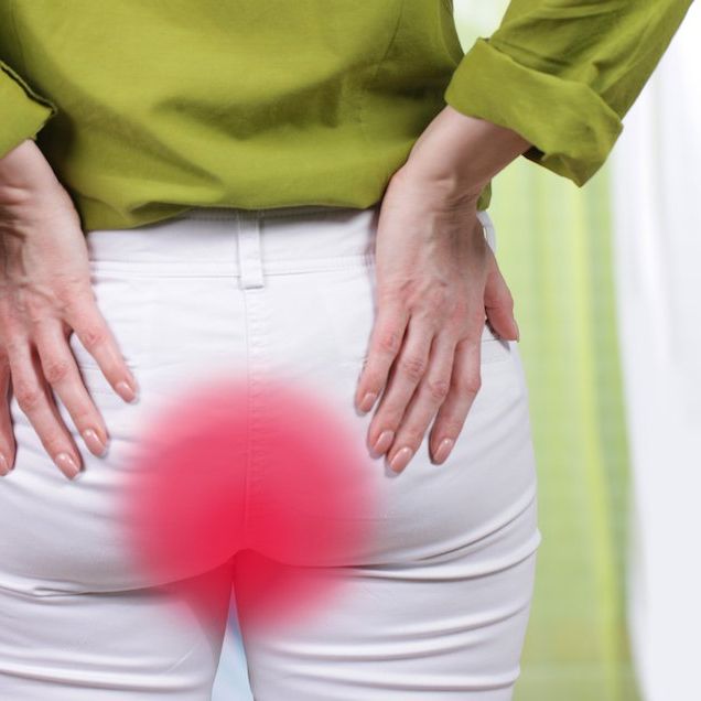 woman with hemorrhoids