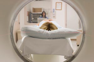 patient goes into an MRI machine