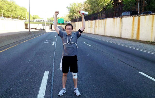 Chris Michel finishing his first 13 mile run in May 2012.