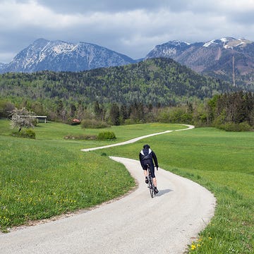 A cyclist on an open road. 