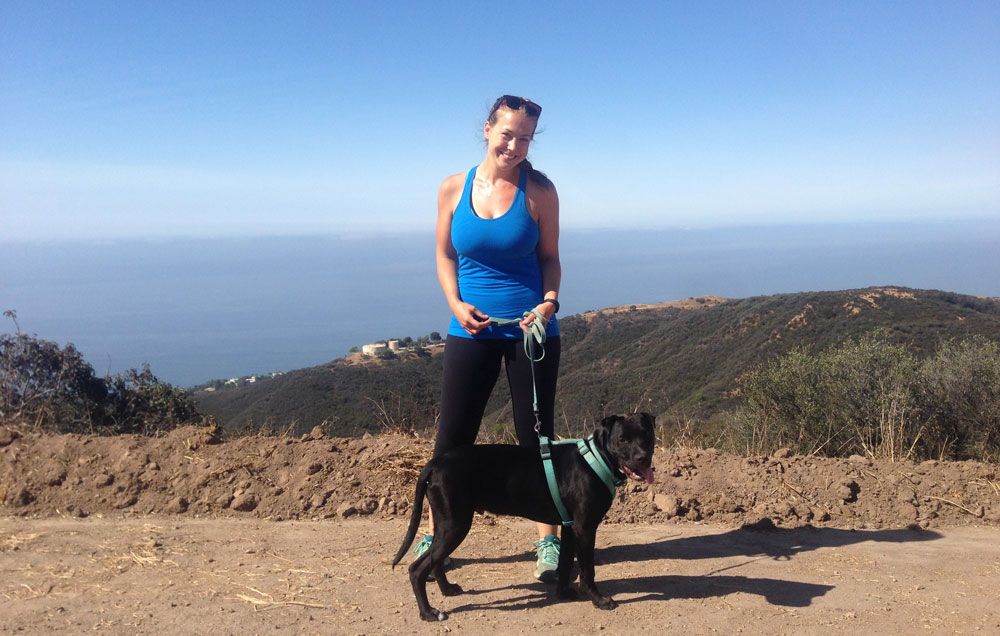 Vegan Amy Bauer hikes with her dog