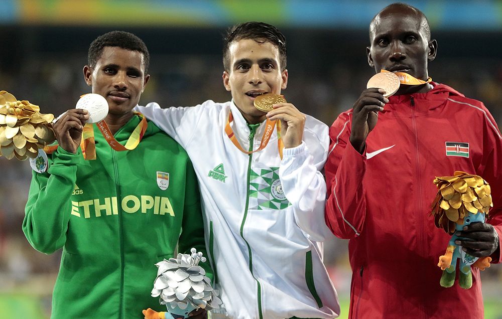 Tamiru Demisse, Abdellatif Baka, and Henry Kirwa at the 1500 meters at the Paralympics.