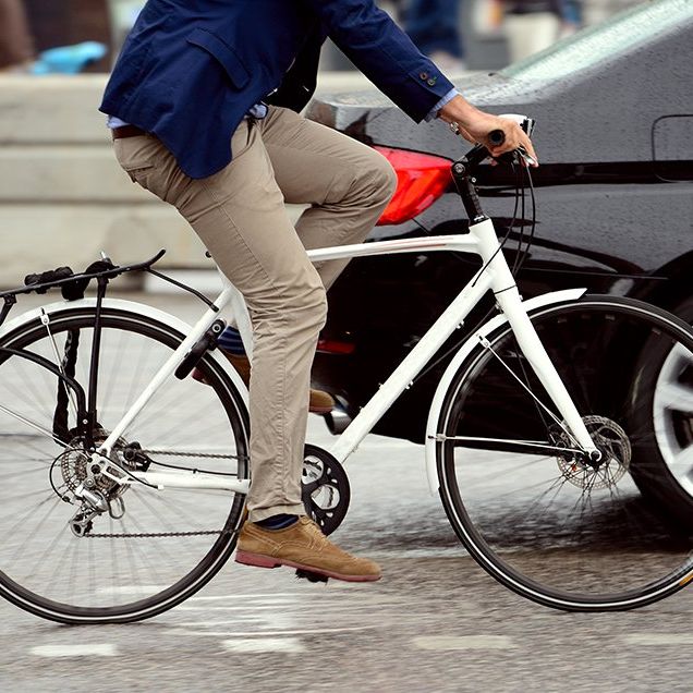A cyclist riding on a city street. 