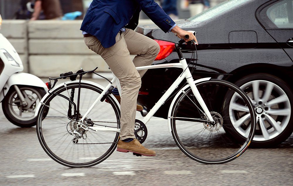 A cyclist riding on a city street. 