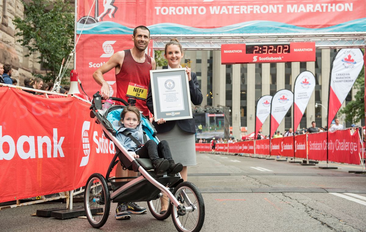 Calum Neff and family after setting stroller marathon record