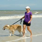 Rebekah Gleason Hope walking dog on the beach