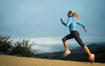 Runner running along a ridge