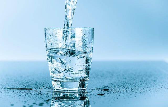 Water pouring into a glass