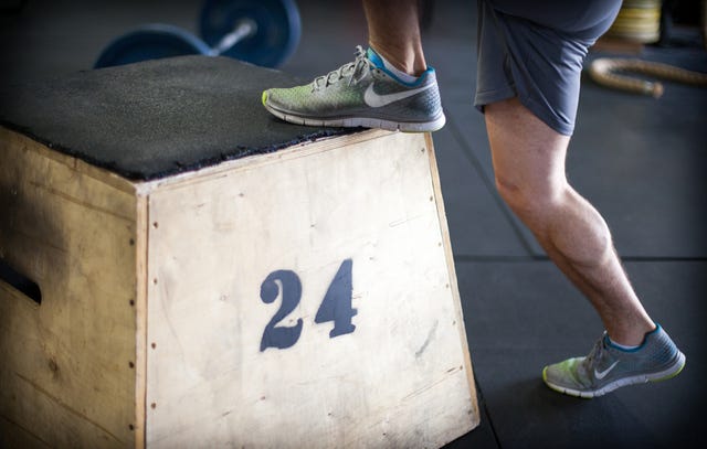 Stepping up onto box.