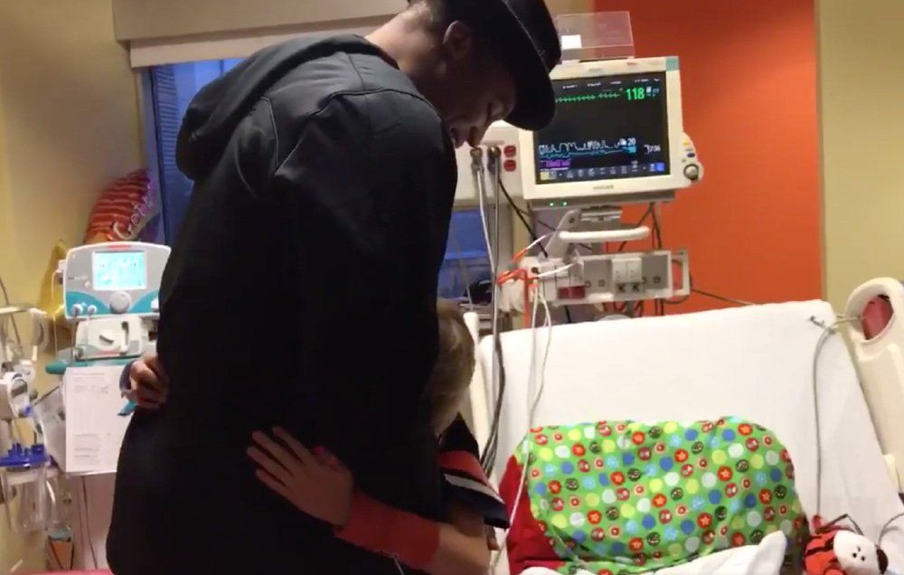 cam newton surprises boy in hospital