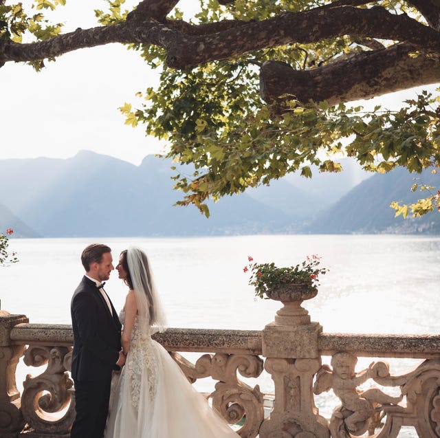 a bride and groom kissing