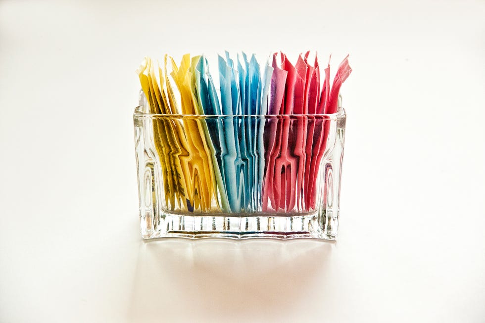 Container holding various sweetener packets