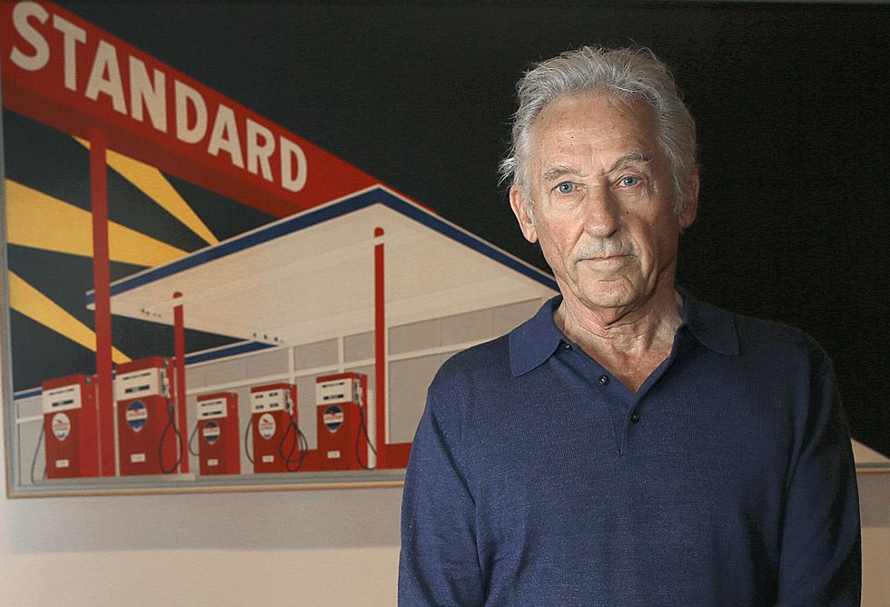 artist ed ruscha stands by "standard station, amarillo, texas", 1963, oil on canvas at the de young museum on wednesday, july 13, 2016 in san francisco, calif., where his great american west exhibit will open this saturday.