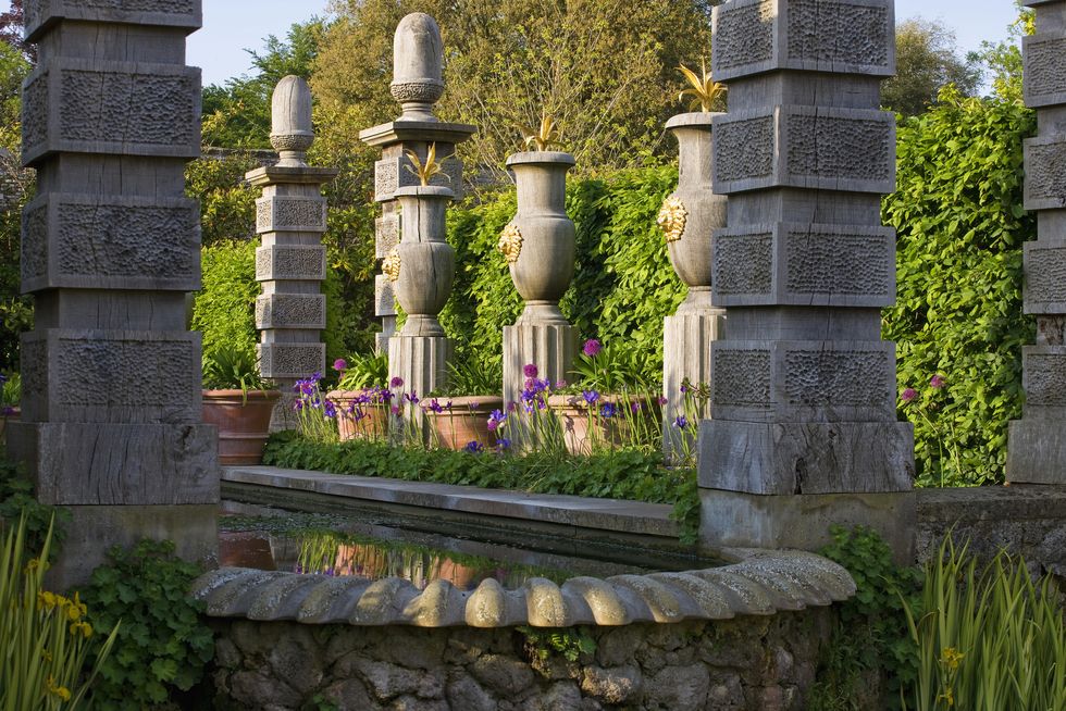 arundel castle garden, west sussex: the collector earls garden; the rill with contrainers