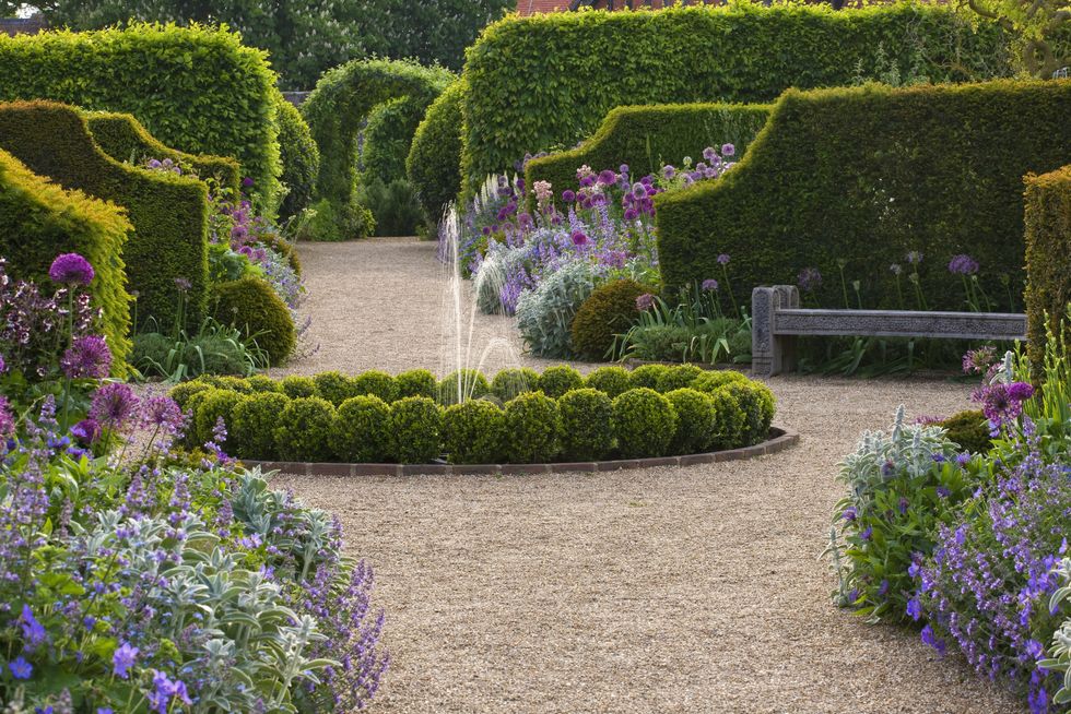 arundel castle gardens, west sussex: asthal manor, oxfordshire: path to fountain with box balls and