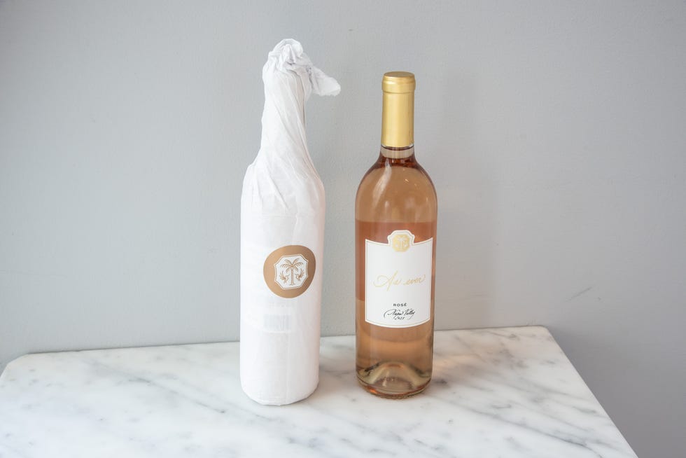 meghan markle as ever rose wine one wrapped and one unwrapped