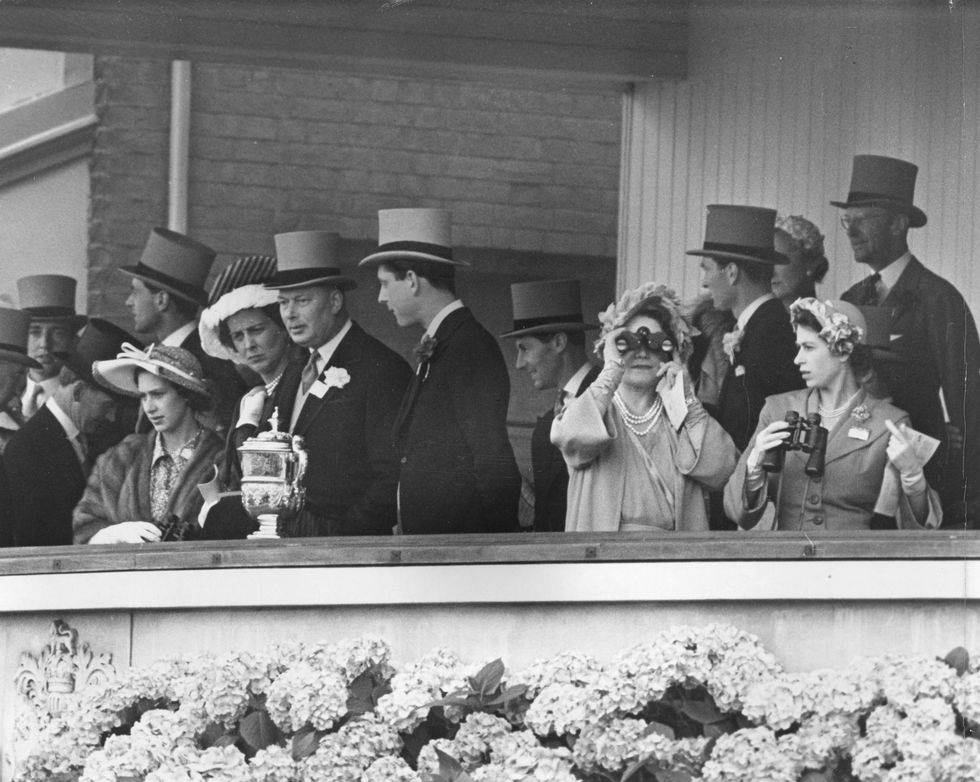 13th june 1951 a royal party watching the races at ascot racecourse on royal hunt cup day left to right princess margaret 1930 2002, katherine, duchess of kent, henry, duke of gloucester, queen elizabeth, queen consort to king george vi looking through her binoculars and princess elizabeth photo by william vandersonfox photosgetty images