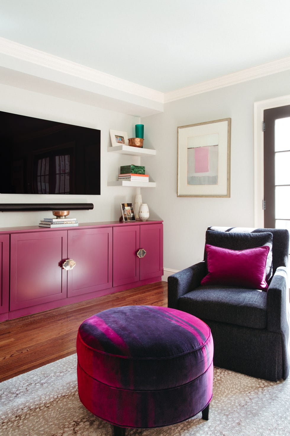 living room with blue ceiling and magenta cabinet