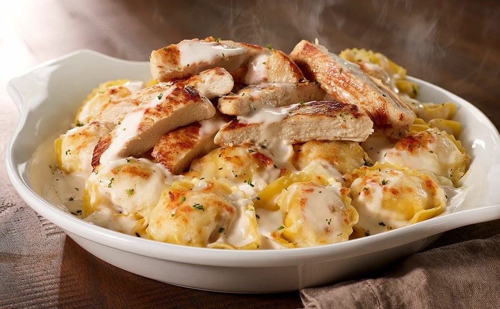 plate of chicken and pasta with creamy sauce