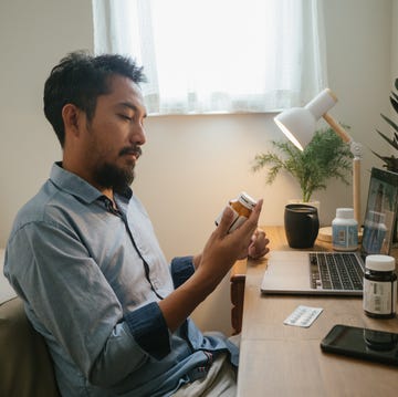 asian man a video telemedicine call with a doctor