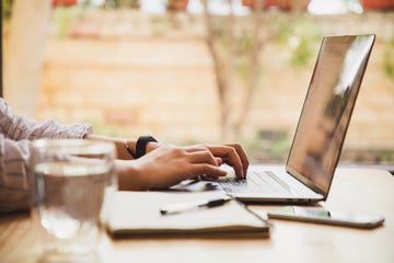 person using laptop to see if they can get a car loan while unemployed