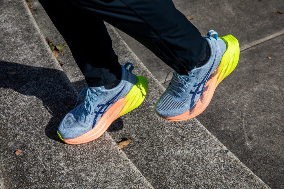 sport shoes with a vibrant color combination on a sidewalk