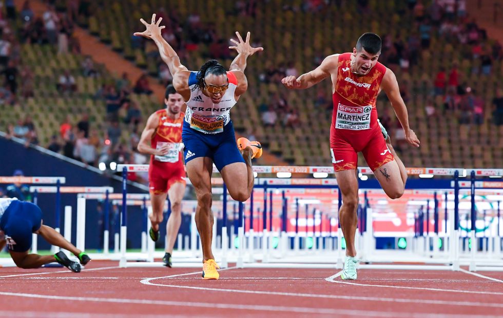 18 august 2022, bavaria, munich european championships, athletics, 110m hurdles, men, final at olympic stadium, asier martinez r, spain wins ahead of pascal martinot lagarde france on the left sasha zhoya france falls on the ground photo sven hoppedpa photo by sven hoppepicture alliance via getty images