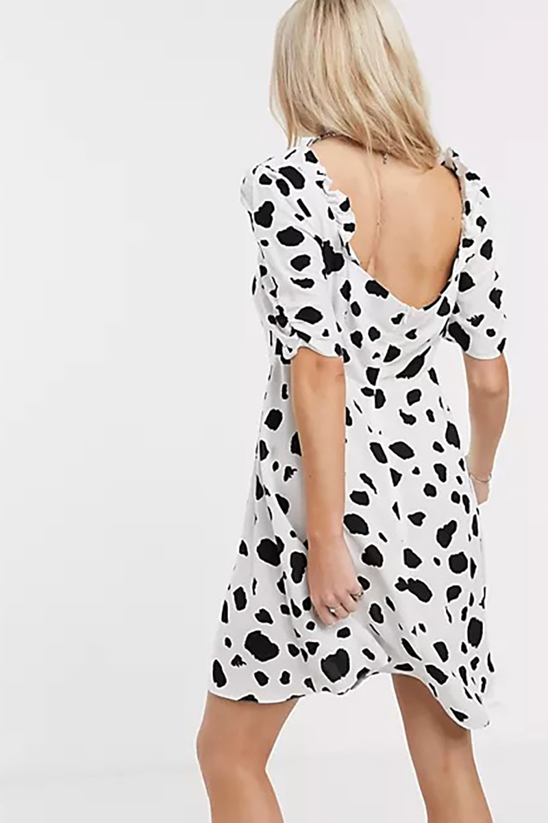 asos product image showing a model with a visibile scoliosis scar
