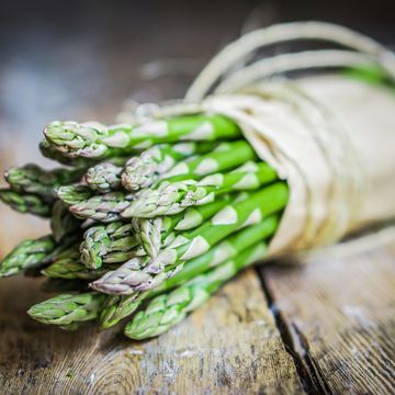 asparagus on rustic wooden background