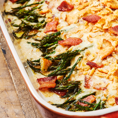 asparagus bacon casserole in a red baking dish