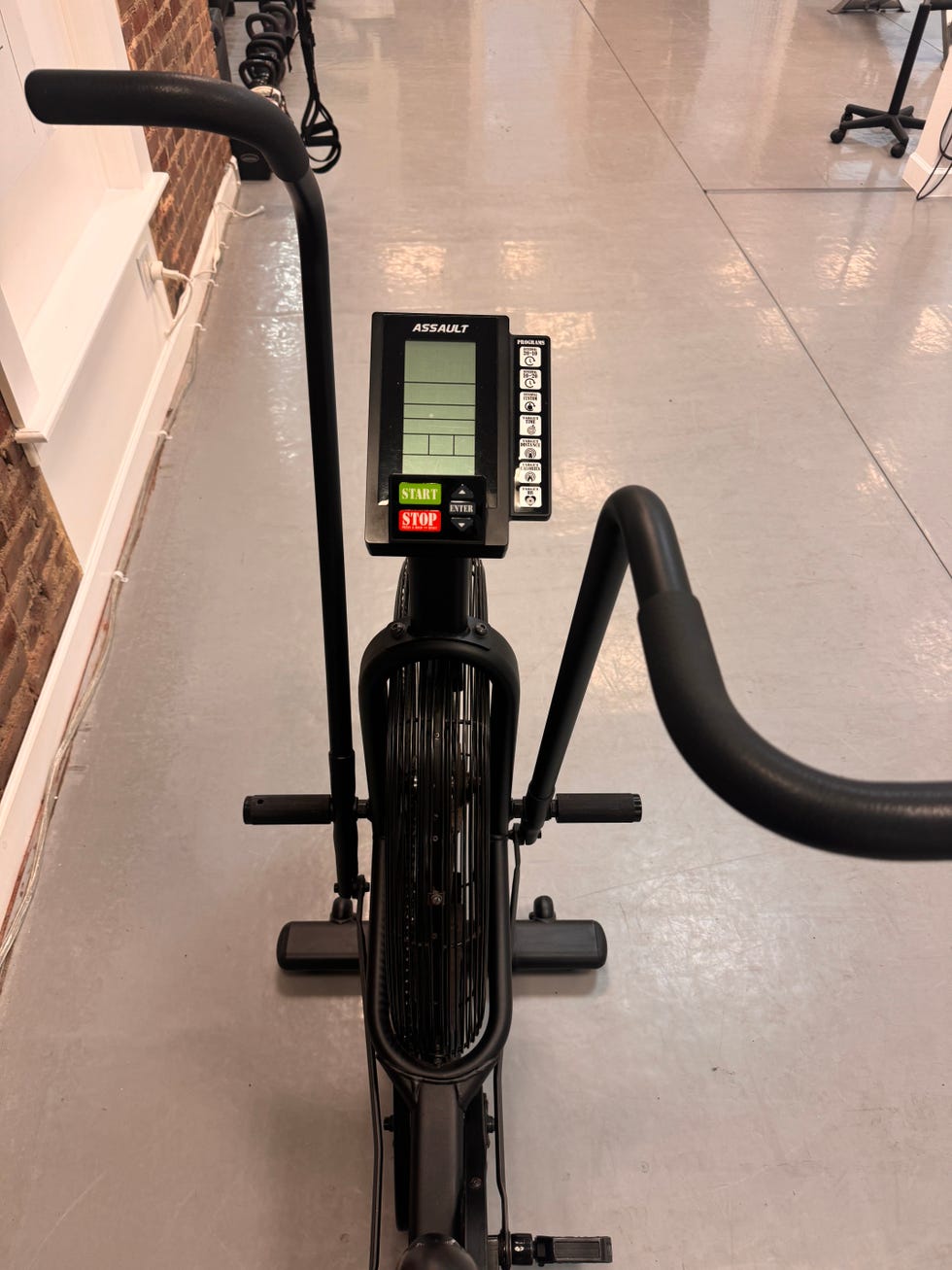 a black and silver exercise bike a black and silver exercise bike