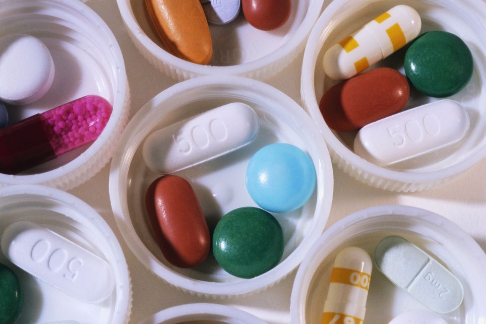 assorted medicine pills in caps