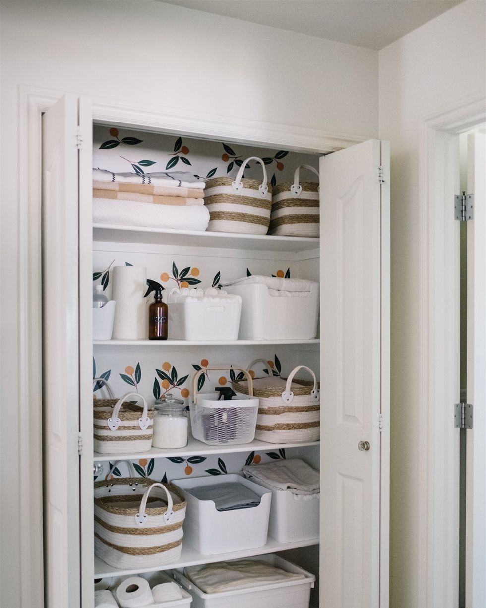 How to Organize a Bathroom Closet - Polished Habitat