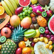 Assortment of colorful ripe tropical fruits. Top view
