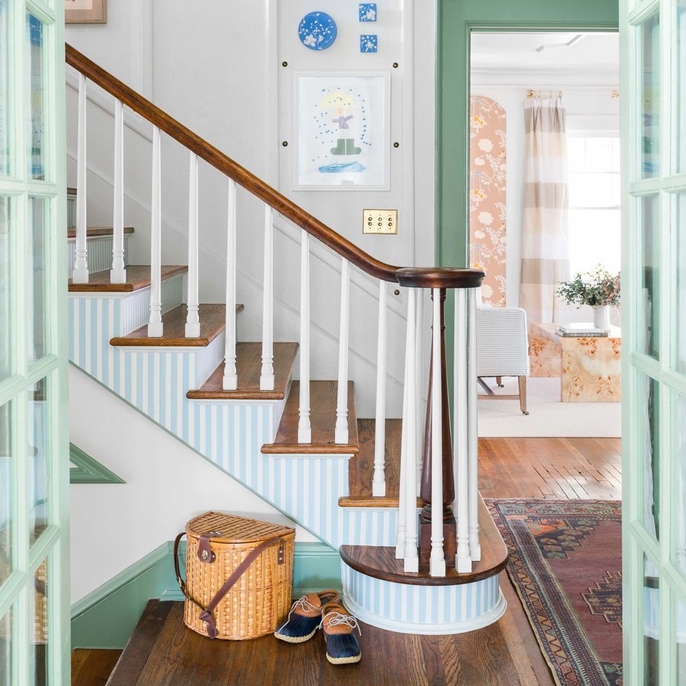 we're obsessed with grace mitchell's wallpapered stairs