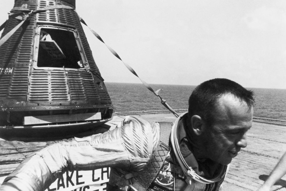 alan shepard with the freedom 7 space capsule
