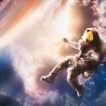astronaut floating in atmosphere