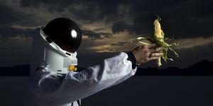 astronaut holding corn the future of ethanol