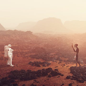 astronaut op mars ontmoet een marsmannetje of alien