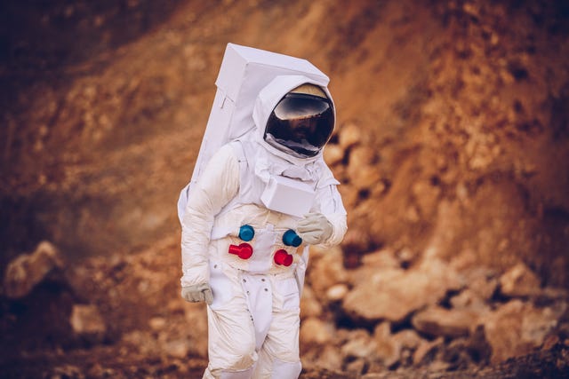 astronaut walking on mars alone