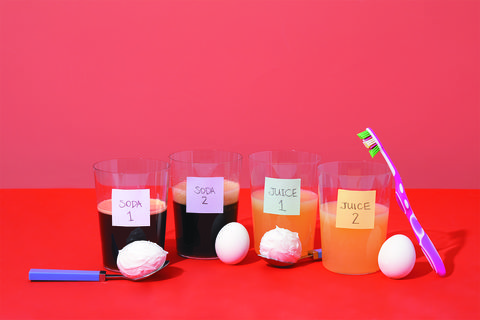 eggs, toothbrushes and different kinds of liquids form the materials for this at home science experiment for kids