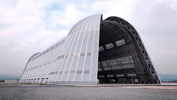 hangar one, at nasa ames moffett federal airfield in mountain view, soars nearly 200 feet high and contains 300,000 square feet of cavernous, column free space