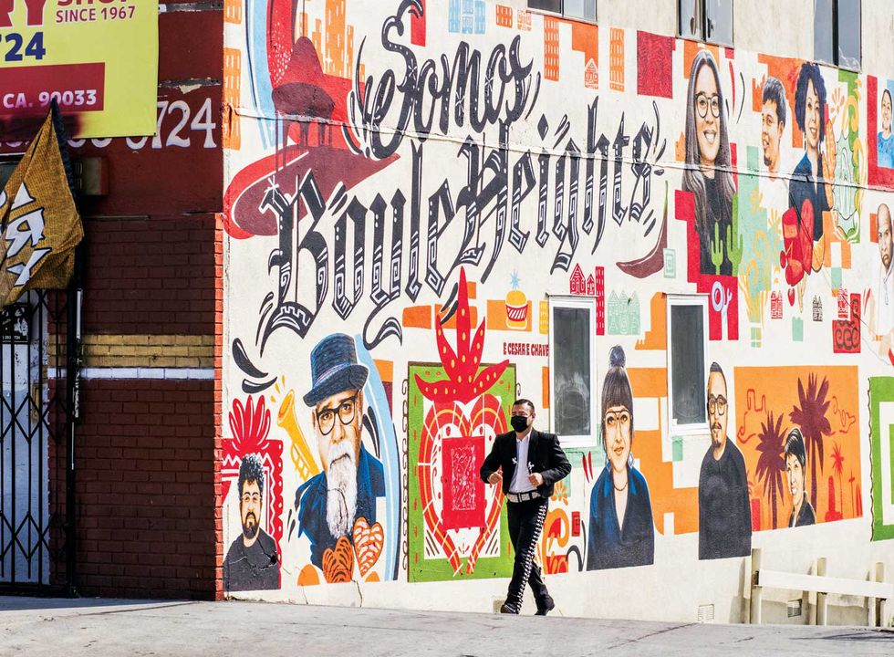 artists marlene solorio and levi ponce, who helped coordinate the “somos boyle heights” project for doordash, painted restaurant owners, poets, educators, and other members of the community in their mural